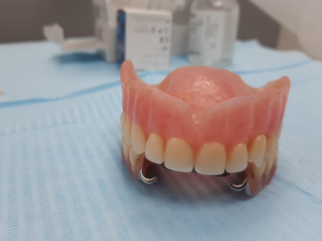Upper and lower dentures